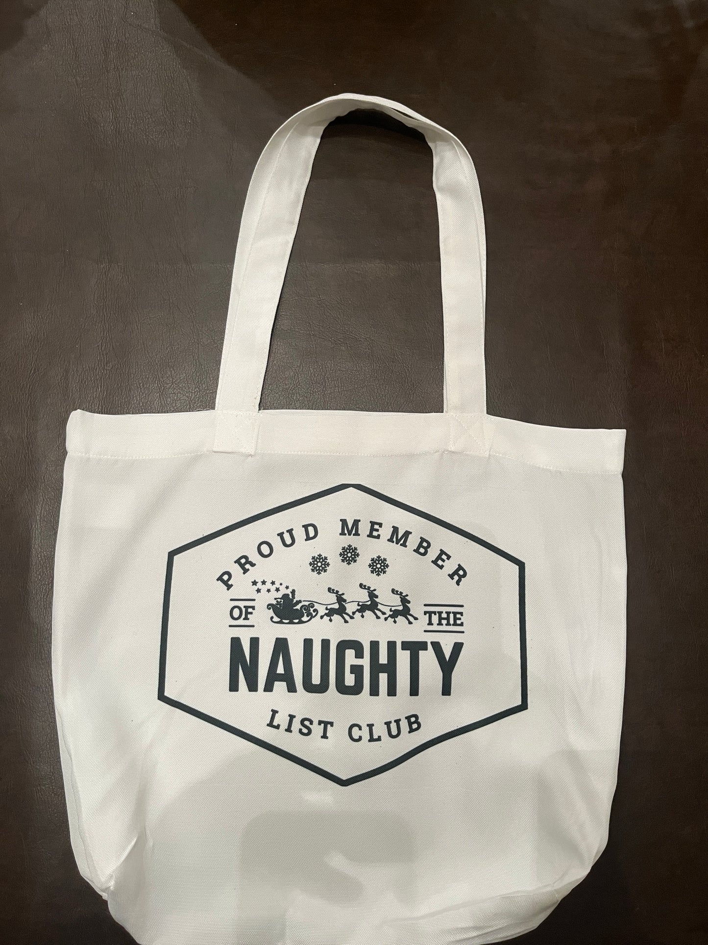 Proud Member of the Naughty List Club Tote Bag